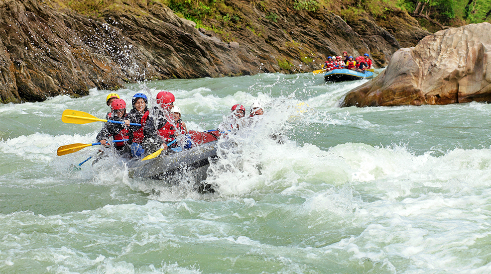 A group white water rafting